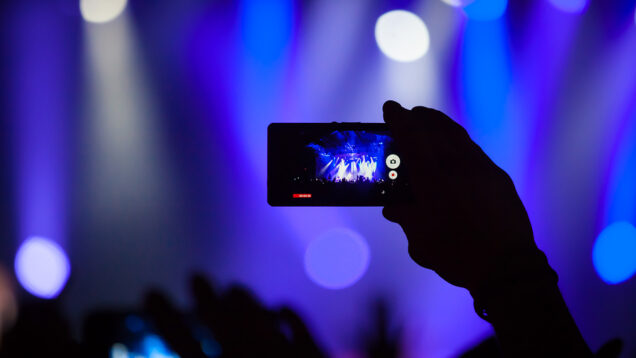 People At Concert Shooting Video Or Photo.